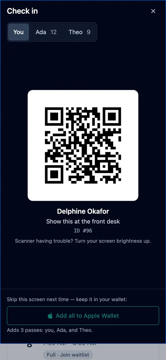 A member's check-in QR code on their phone